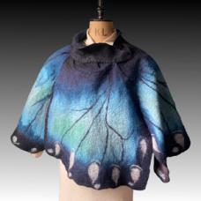 Hand-felted Merino wool butterfly cape. The underside of the wings are also represented faithfully  making this a reversible cape.