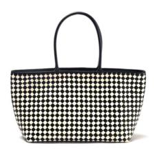 woven black and white checkered leather bag