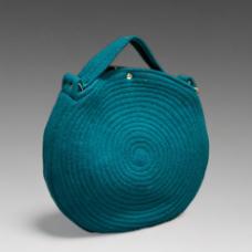 round bag with handle and swirl pattern