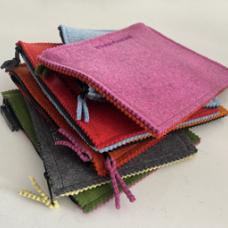 stack of flat fabric pouches