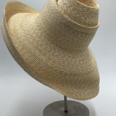 straw tiered and brimmed hat