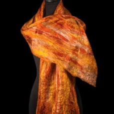 This scarf is made with wool and viscous fibers felted onto a wool and silk base.