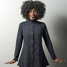 model with long, high-collared jacket