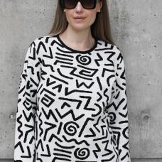 white and black sweater