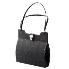 The lotus bag is shown here in the black finish and is hand fabricated in stainless steel with black leather gussets  double shoulder straps and a turn lock closure.