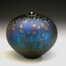High fire porcelain with Newest Starry Night Glaze. Wheel thrown. Fired for 25 hours at cone 12