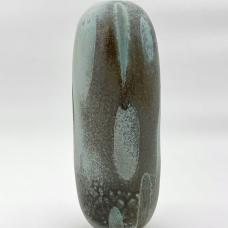 Piece based on the myth of Orpheus. Glazes include local materials collected from three rivers in Western  Ma. Glaze reacts to the rock  sand  and dirt collected making ghostlike teardrop decoration. Soda fired stoneware.