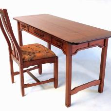My design on a Greene and Greene desk and side chair shown in Sapele and Ebony. 