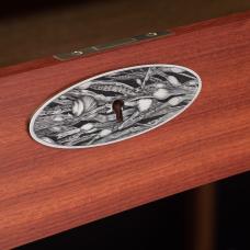 A writing desk in Narra with bloodwood drawer fronts and hand-engraved hardware.