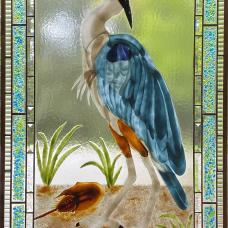 Fused glass Great Blue Heron created with glass powders and frit for each individual feathers  along with the horseshoe crab and shells.