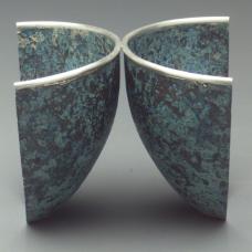 This is part if a karger collection of de-constructed bowls. Identical bowls were spun and then taken aoart and re-assembled. The purpose was to emohasize that there is &amp;quot;beauty&amp;quot; (however you describe that term) in even the most known  cliched items.