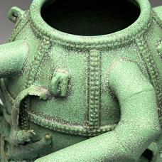 Detail of converter vessel vase .Wheel thrown and altered stoneware clay.Stoneware glaze