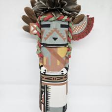 The Supai Kachina is a representation of the Havasupai tribe  he is often seen during the winter night and summer day dances. The Supai kachina is carved out of aged dried cottonwood root  painted with natural earth mineral paints that i hand collect and process myself. Duck feathers  partridge feathers and natural colored dyed yarn is used to complete the Supai Kachina.