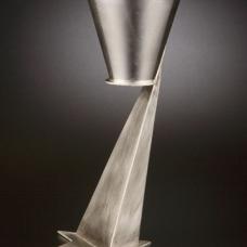 Fabricated sterling silver. The cup reaches skyward invoking hope for the future.