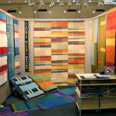 Booth with textiles on walls