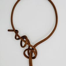 Steam-bent  self-latching choker