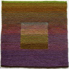 knitted square with color gradient. There is a square in the center with the inverse of that gradient