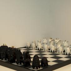 Complete chess set. The chess pieces are made of porcelain using hand building technique.