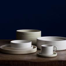 Sturdy cylindrical shaped ware hand thrown from porcelaneous clay. The dimensions and price are for a single dinner plate.