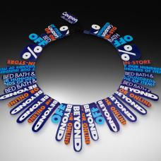 Bed Bath and Beyond Coupons are hand-formed into beads and stitched together into the form of a neckpiece.