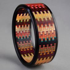 Linear Mosaic Bracelet made with the natural colors and grains of 12 different specie of wood and artist hand dyed veneers.