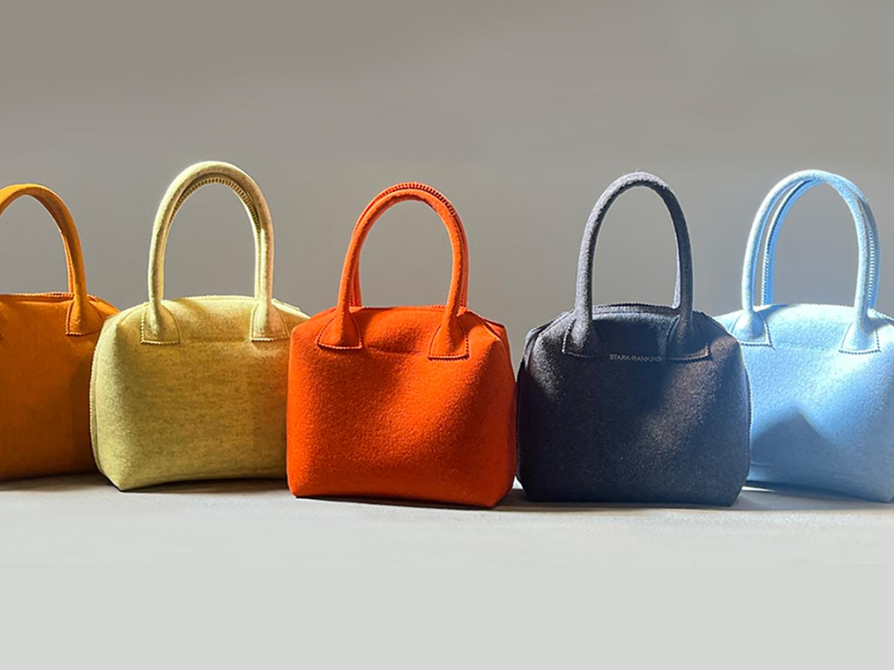 A row of colorful purses